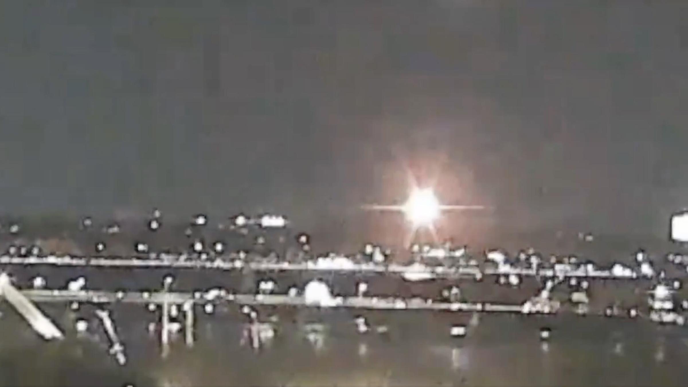 Footage from an EarthCam live camera shows the moment a regional jet collided in midair with a Black Hawk helicopter while on approach to land at Reagan Washington National Airport.